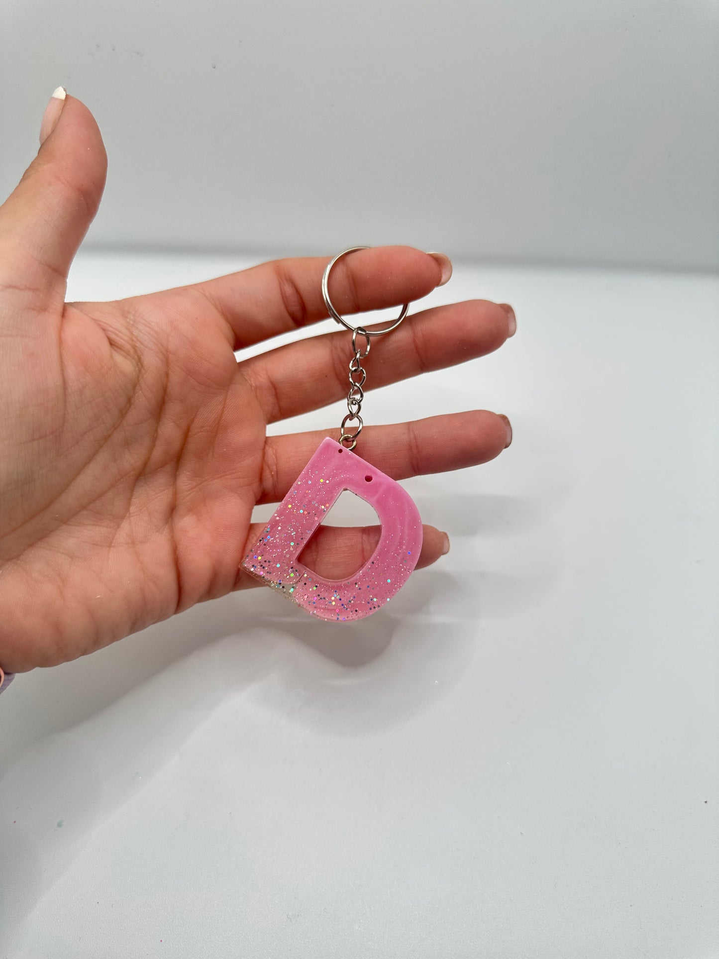 Llavero inicial en resina