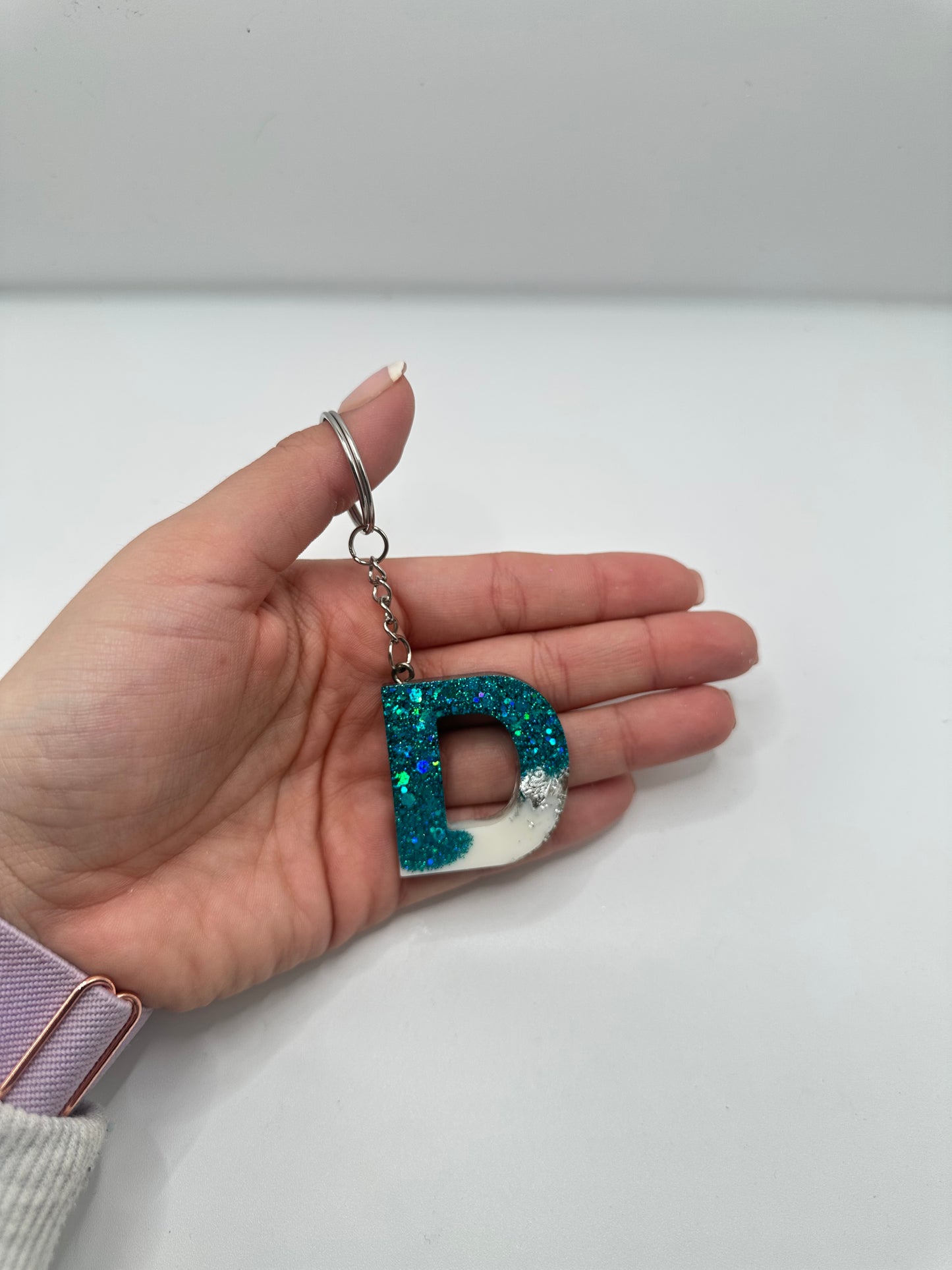 Llavero inicial en resina