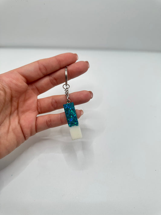 Llavero inicial en resina