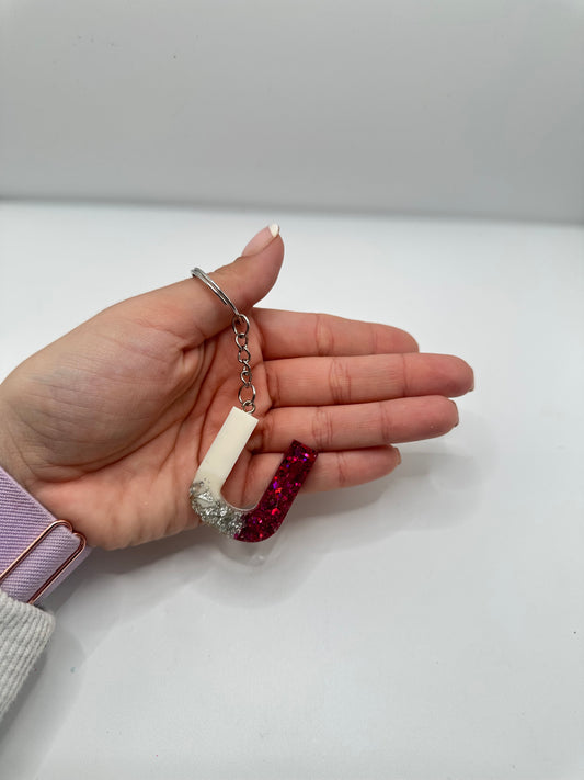 Llavero inicial en resina