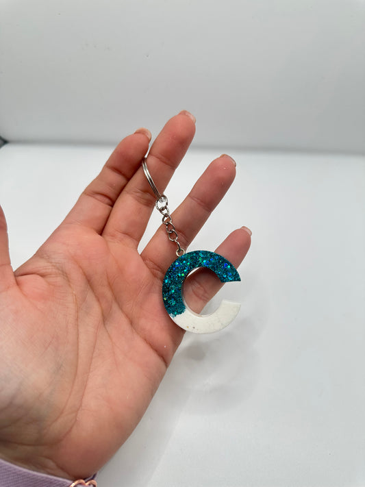 Llavero inicial en resina