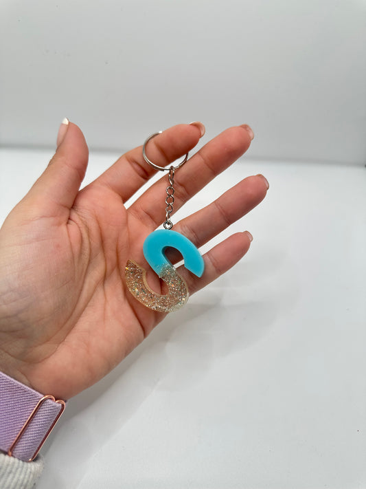 Llavero inicial en resina