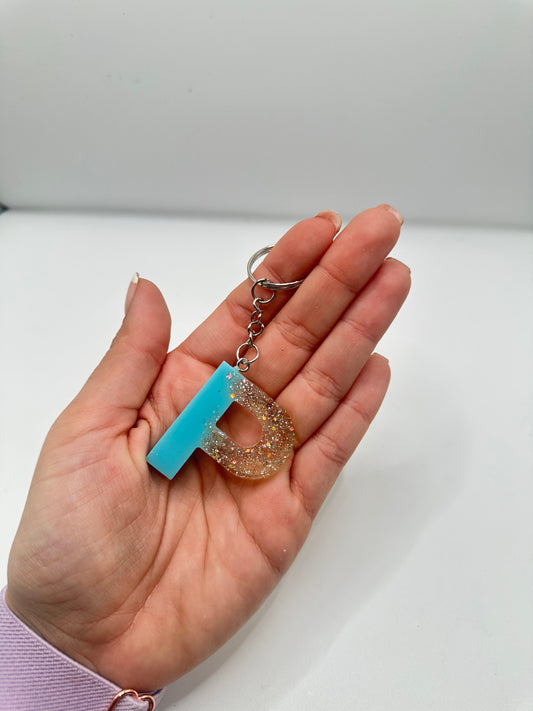 Llavero inicial en resina