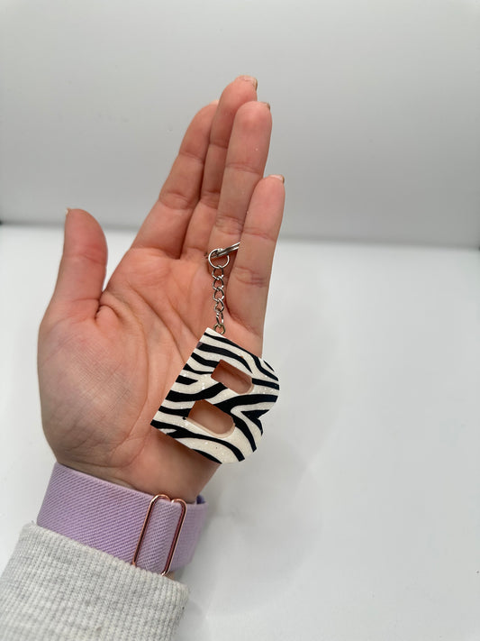 Llavero inicial en resina