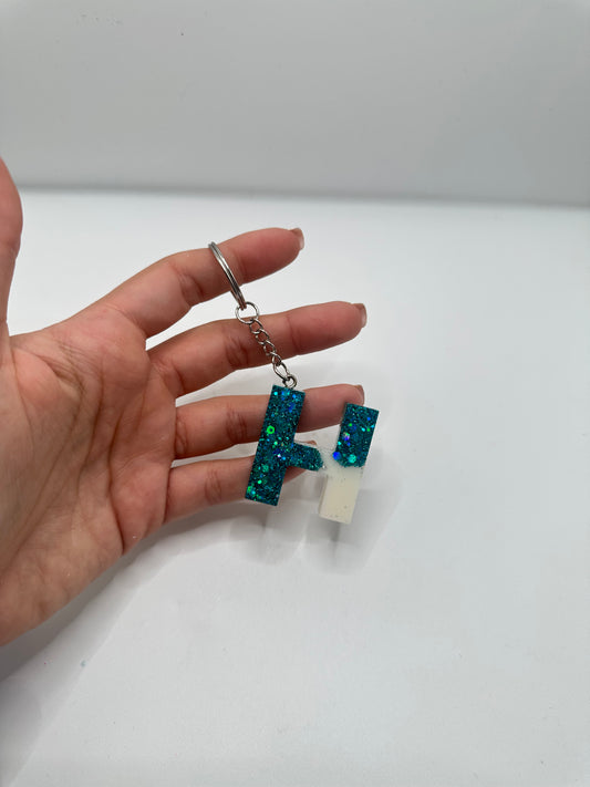 Llavero inicial en resina