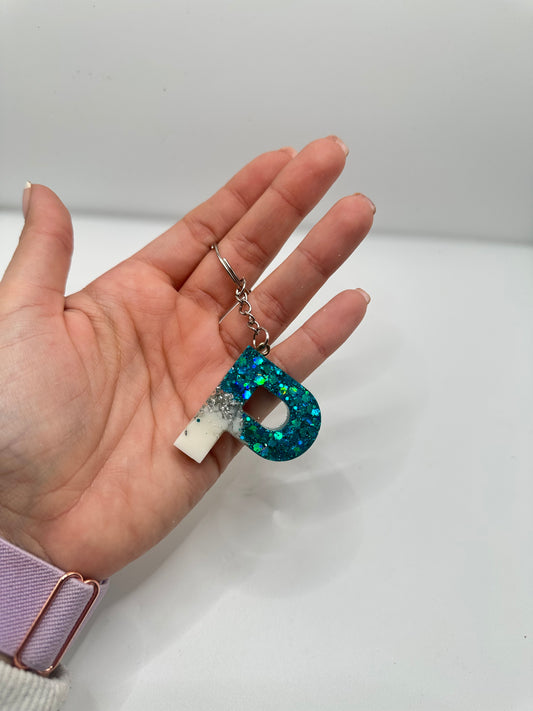 Llavero inicial en resina