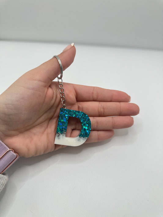 Llavero inicial en resina